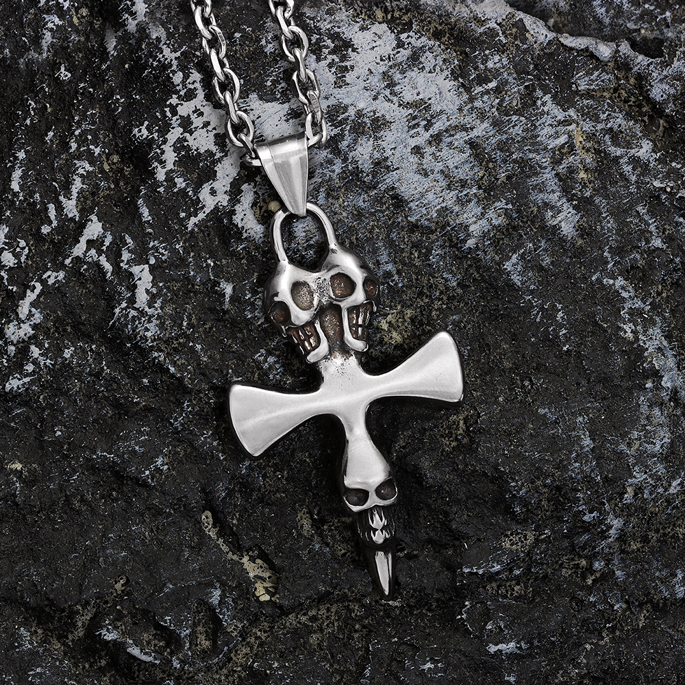 Three Skulls Cross Pendant